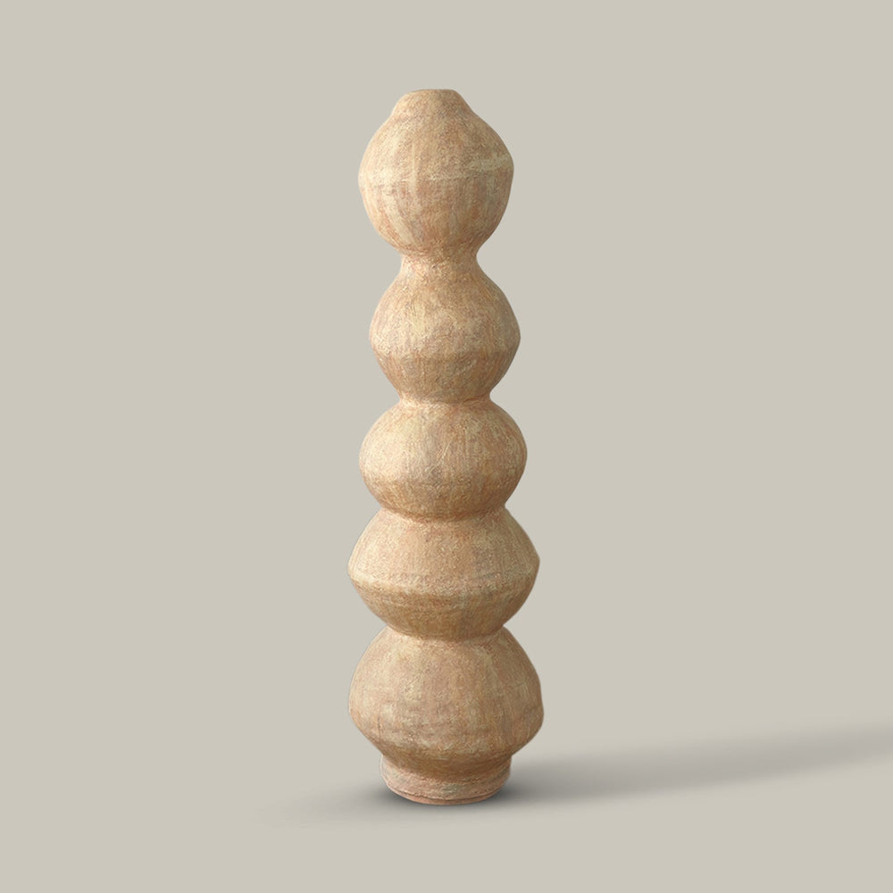 Lemieux et Cie Marcel Totem, sculptural stacked sphere form in warm neutral tone, decorative totem shown against soft taupe backdrop.