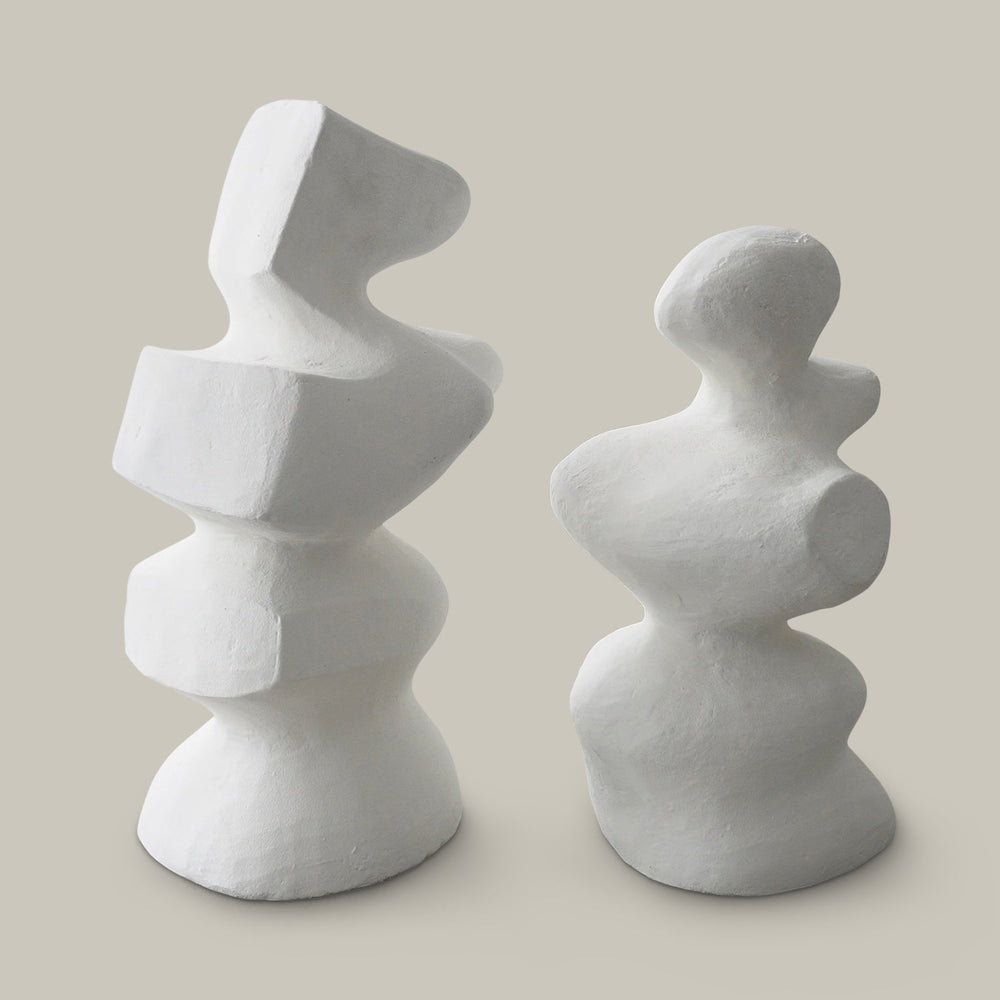 Lemieux et Cie Mouren Sculpture in white concrete, sculptural organic form with stacked rounded shapes, shown on neutral studio backdrop.