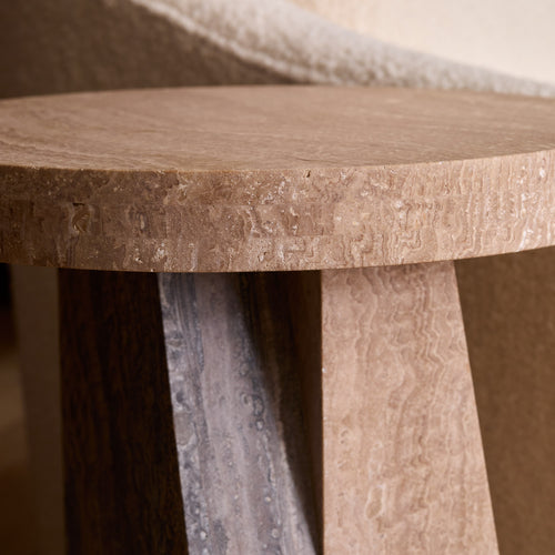 Lemieux et Cie Borel Side Table in walnut finish, sculptural side table with rounded top and angled base, detail shot in warm interior setting.