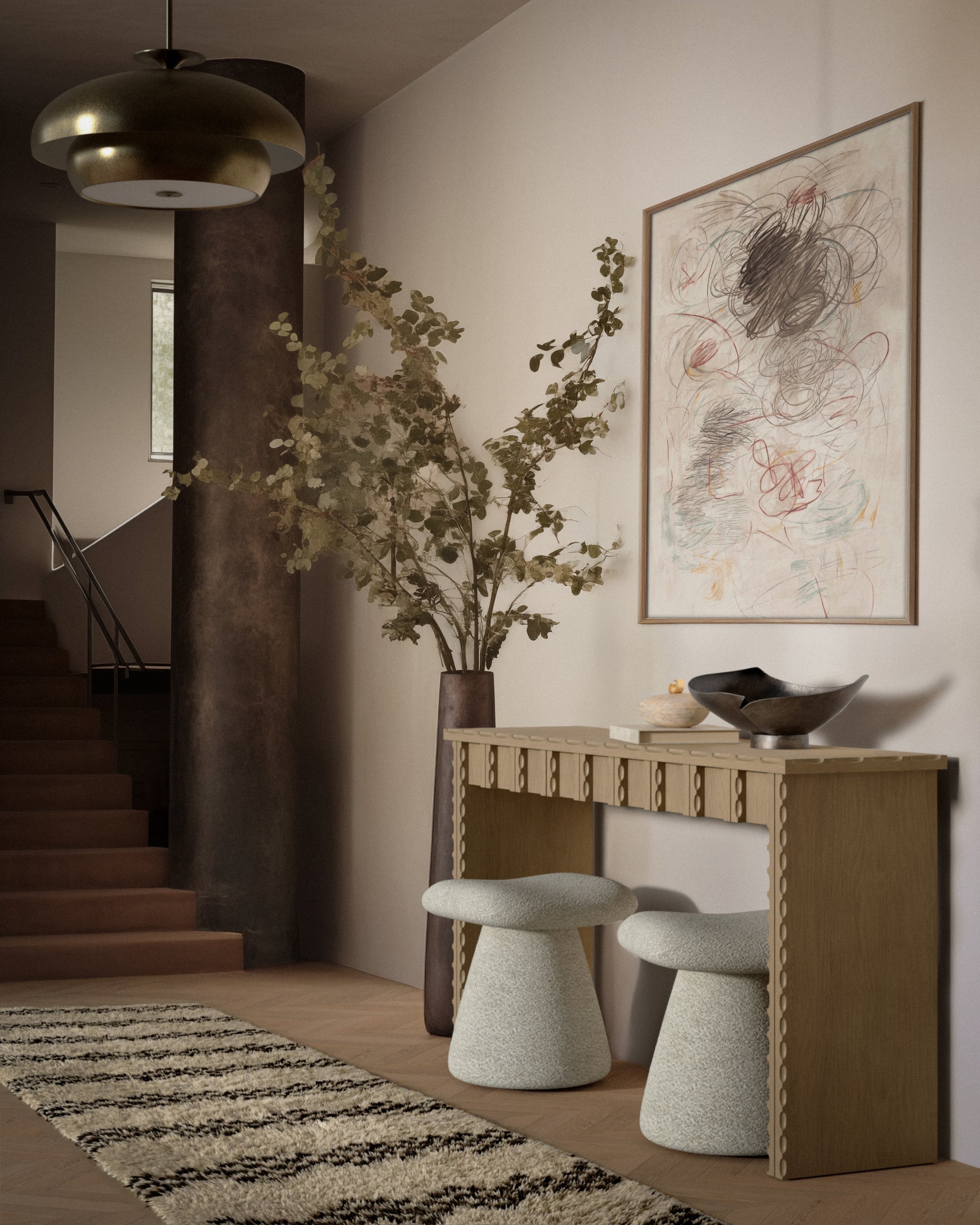 Modern interior with Marchand console table, Romystools, and abstract art on the wall.