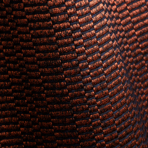Apollo Lave geometric jacquard upholstery fabric by Metaphores in copper and lava red on black