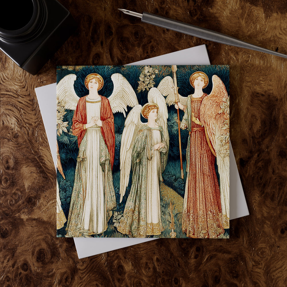 Lemieux et Cie Archangels Greeting Card Set in lapis and gold tones, fine art linen card on white envelope, styled on rich burl wood desk surface.