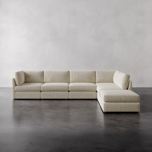 Lemieux Et Cie Chanaux 6-Pc Sectional
Beige sectional sofa on a gray floor with a plain gray wall background
