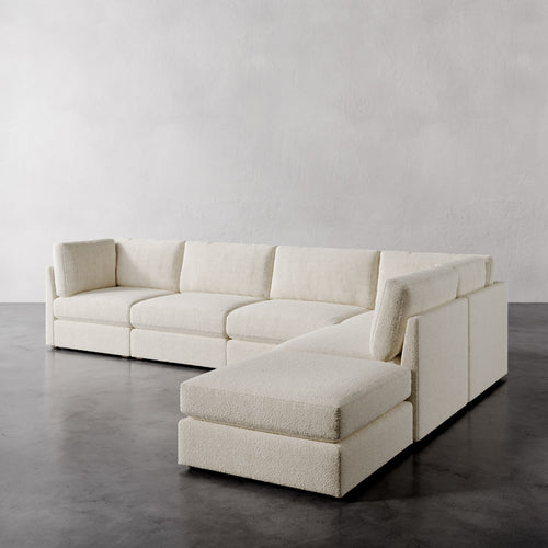 Lemieux Et Cie Chanaux 6-Pc Sectional
Beige sectional sofa on a gray floor with a plain white wall background