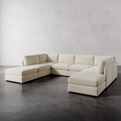 Lemieux Et Cie Chanaux 8-Pc Sectional
Beige sectional sofa on a dark floor with a light gray wall background