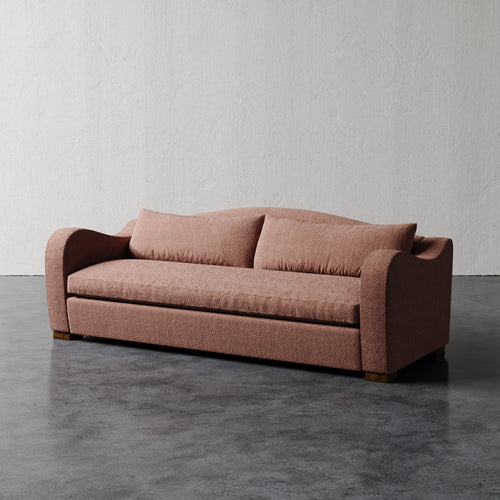 Lemieux Et Cie Elodie Sofa - Bench Seat (Made-to-order) Brown sofa on a gray floor with a white wall background