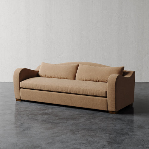 Lemieux Et Cie Elodie Sofa - Bench Seat (Made-to-order) Beige sofa on a gray floor with a white wall background