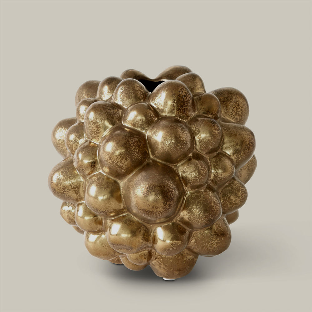 Lemieux et Cie Bubble Vase in warm patinated finish, sculptural spherical ceramic form with clustered bubble texture, shown on neutral studio backdrop.
