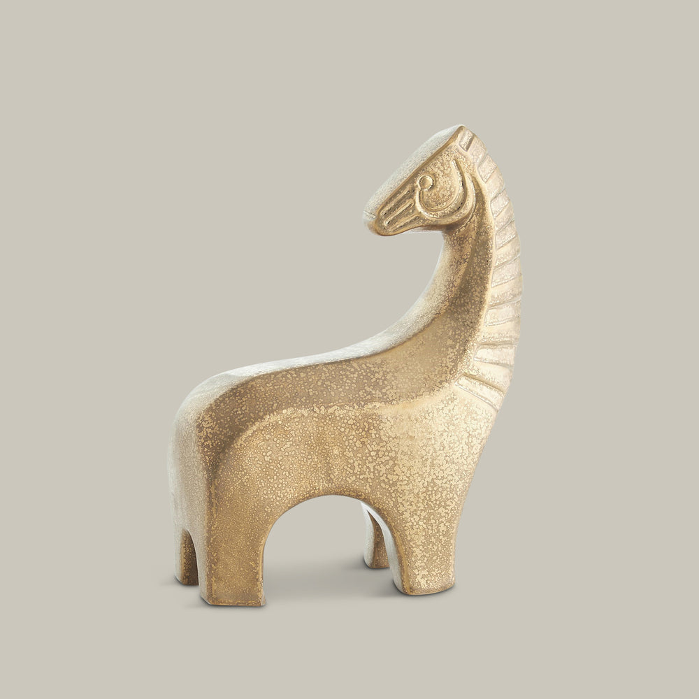 Lemieux et Cie ceramic horse figurine with textured surface and decorative carved details, shown on neutral studio backdrop.
