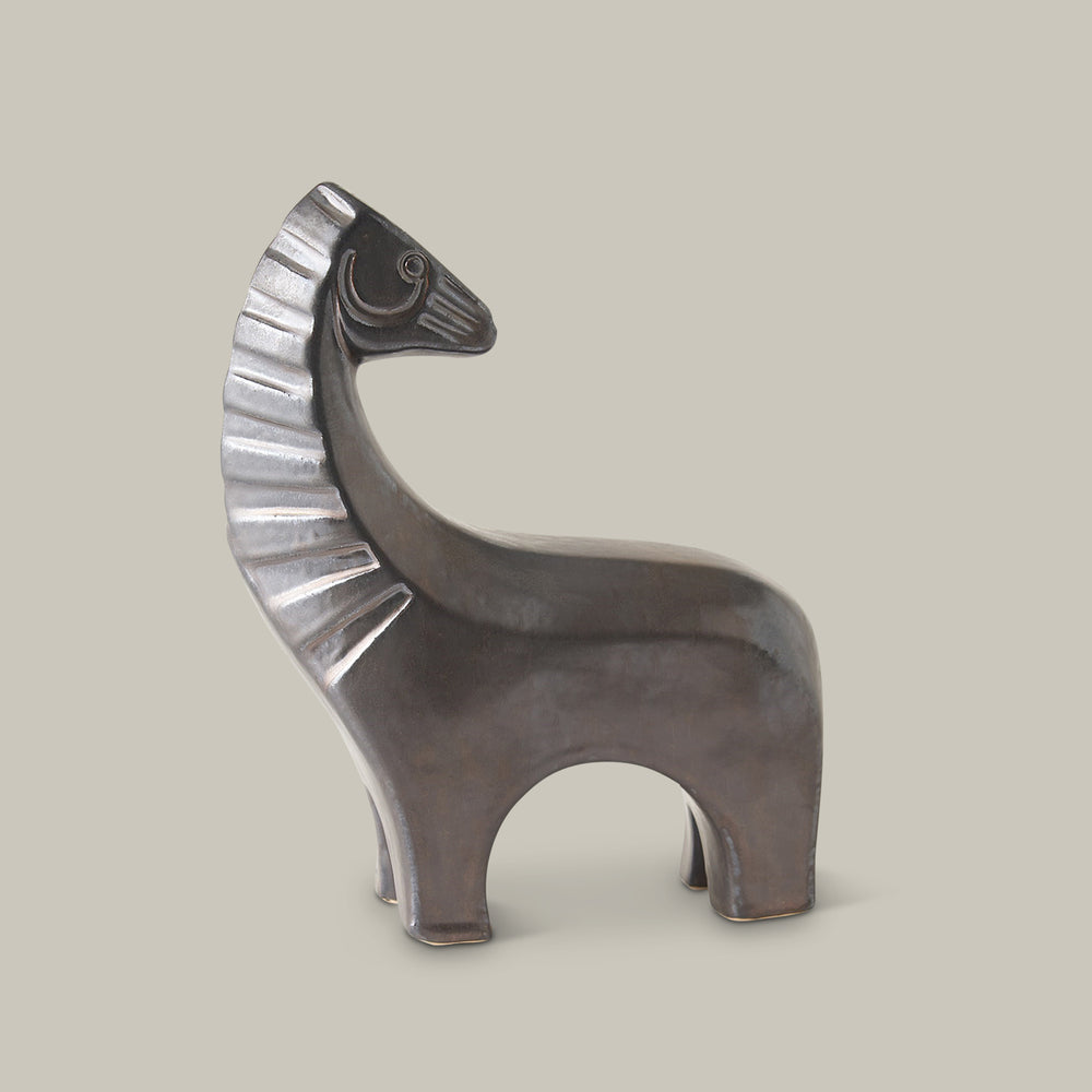 Lemieux et Cie sculptural horse figurine in dark charcoal finish, decorative object shown on neutral studio backdrop.
