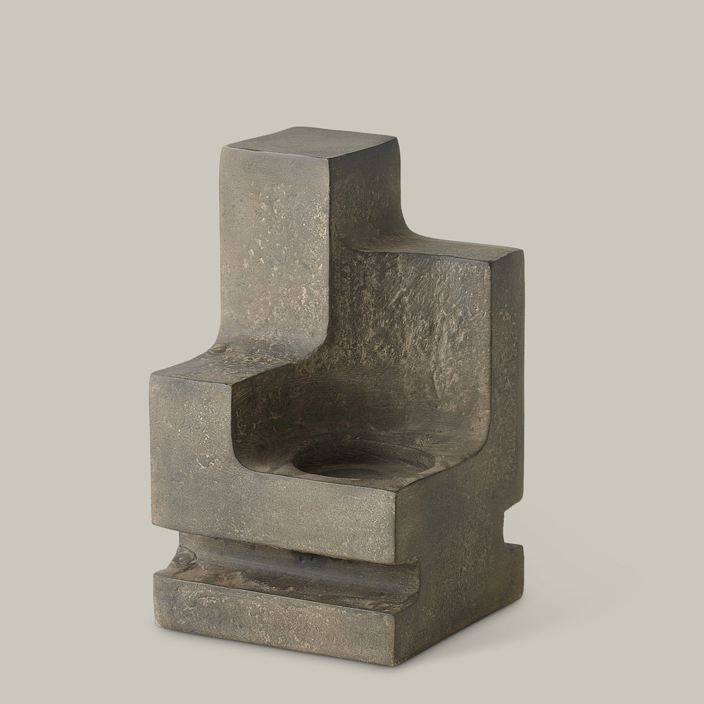Lemieux et Cie La Structure Sculptural Pillar Holder in grey, geometric stepped form with textured surface, shown on neutral studio backdrop.
