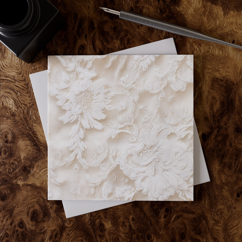 Lemieux et Cie Chantilly Lace Greeting Card Set in ivory with floral pattern, luxury stationery on linen paper, shown on burled desk surface.
