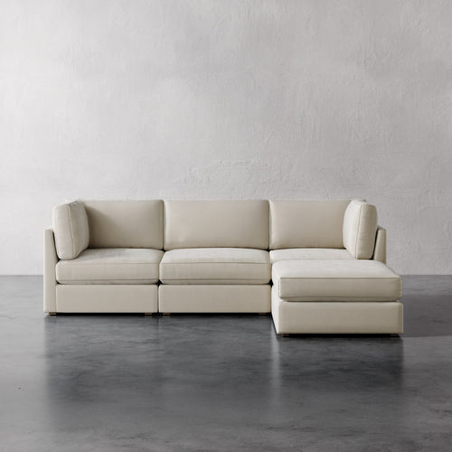 Lemieux Et Cie Chanaux 4-Pc Sectional
 Beige sectional sofa against a plain gray wall.