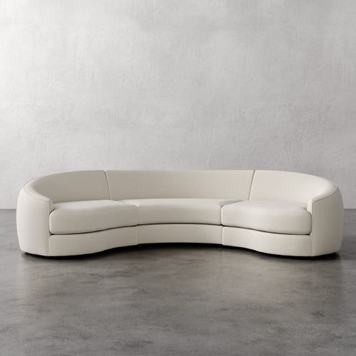 Lemieux Et Cie Rulmann Rulmann 3-Piece Sectional Curved beige sofa against a plain wall