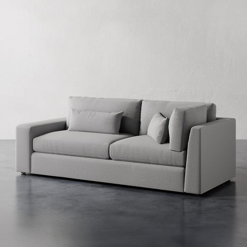 Lemieux Et Cie Lacroix Left or Right Return Sofa A dark green, modular Lacroix Left or Right Return Sofa with a modern design, featuring deep seats and clean rectilinear lines.