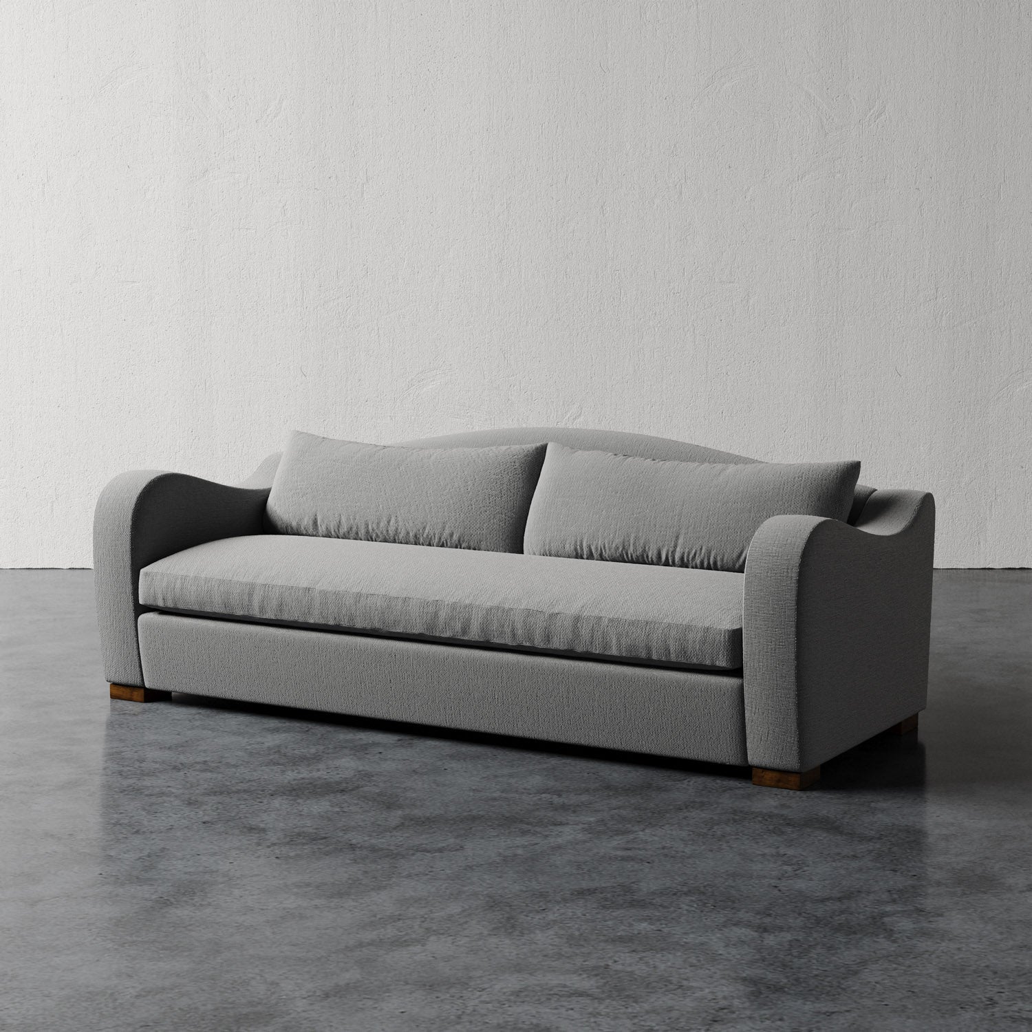 Lemieux Et Cie Elodie Sofa - Bench Seat (Made-to-order) Gray sofa in a minimalistic room with a plain wall and floor.