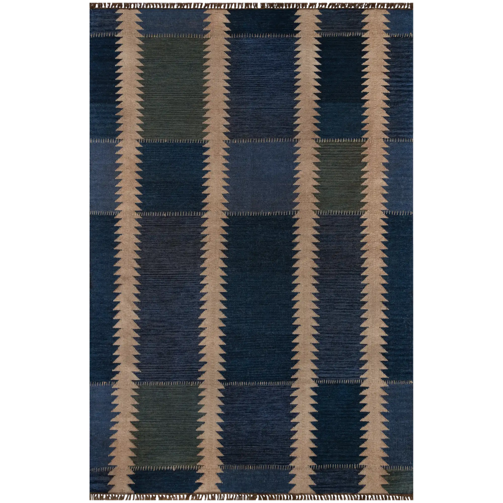 Lemieux et Cie Duar rug in deep indigo and olive with geometric grid pattern, handwoven flatweave shown on white studio backdrop.