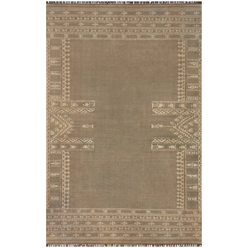 Lemieux et Cie Metlili rug in warm taupe with geometric border motifs, handwoven wool with antique wash, shown on white studio backdrop.
