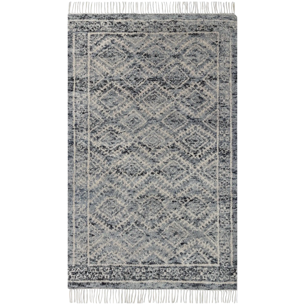 Lemieux et Cie Doukkala rug in grey and charcoal hand-knotted wool with geometric pattern and hand-shorn pile, shown on white studio backdrop.