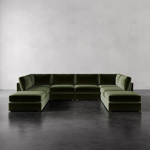Lemieux Et Cie Chanaux 8-Pc Sectional
Green sectional sofa on a gray floor with a plain gray wall background