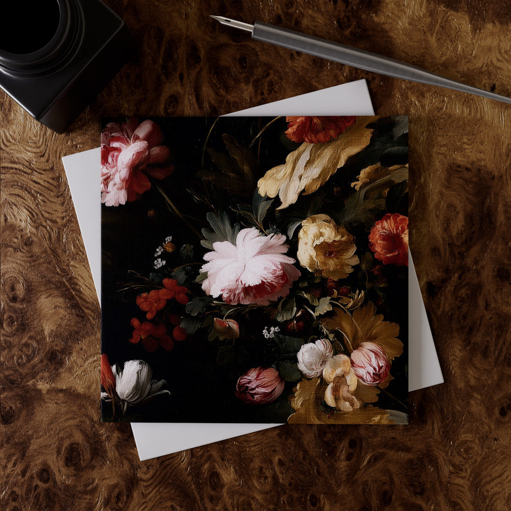 Lemieux et Cie Floral Greeting Card Set with dark botanical blooms on linen paper, styled on burl wood desk with envelope and pen.