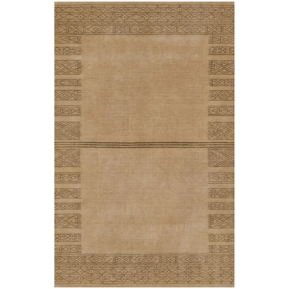 Lemieux et Cie rug in warm neutral tones with geometric border motif, handwoven carpet shown on white studio backdrop.