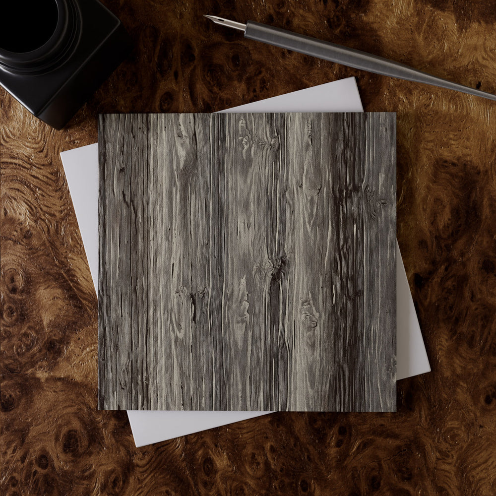 Lemieux et Cie Faux Bois Greeting Card Set, grey wood grain pattern on linen paper, atop burl wood surface with pen and envelope.
