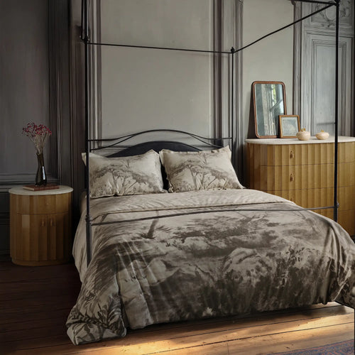 Lemieux et Cie Ondara Fluted Dresser in champagne eucalyptus with travertine top, five-drawer dresser styled in a bedroom with canopy bed and wood flooring.