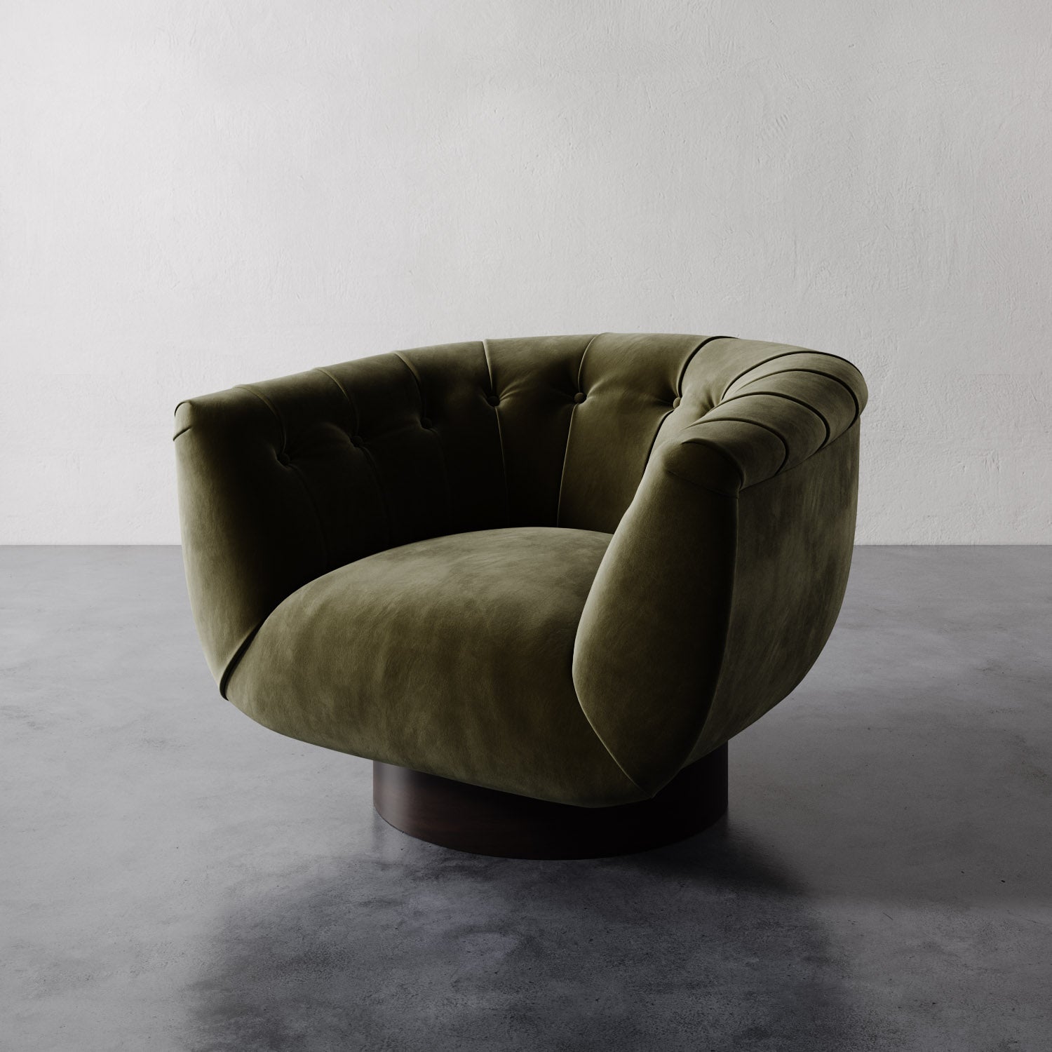 Green balsam velvet Lemieux et Cie Lune Swivel Chair with a rounded tufted back and sculptural silhouette against a white wall and gray floor.