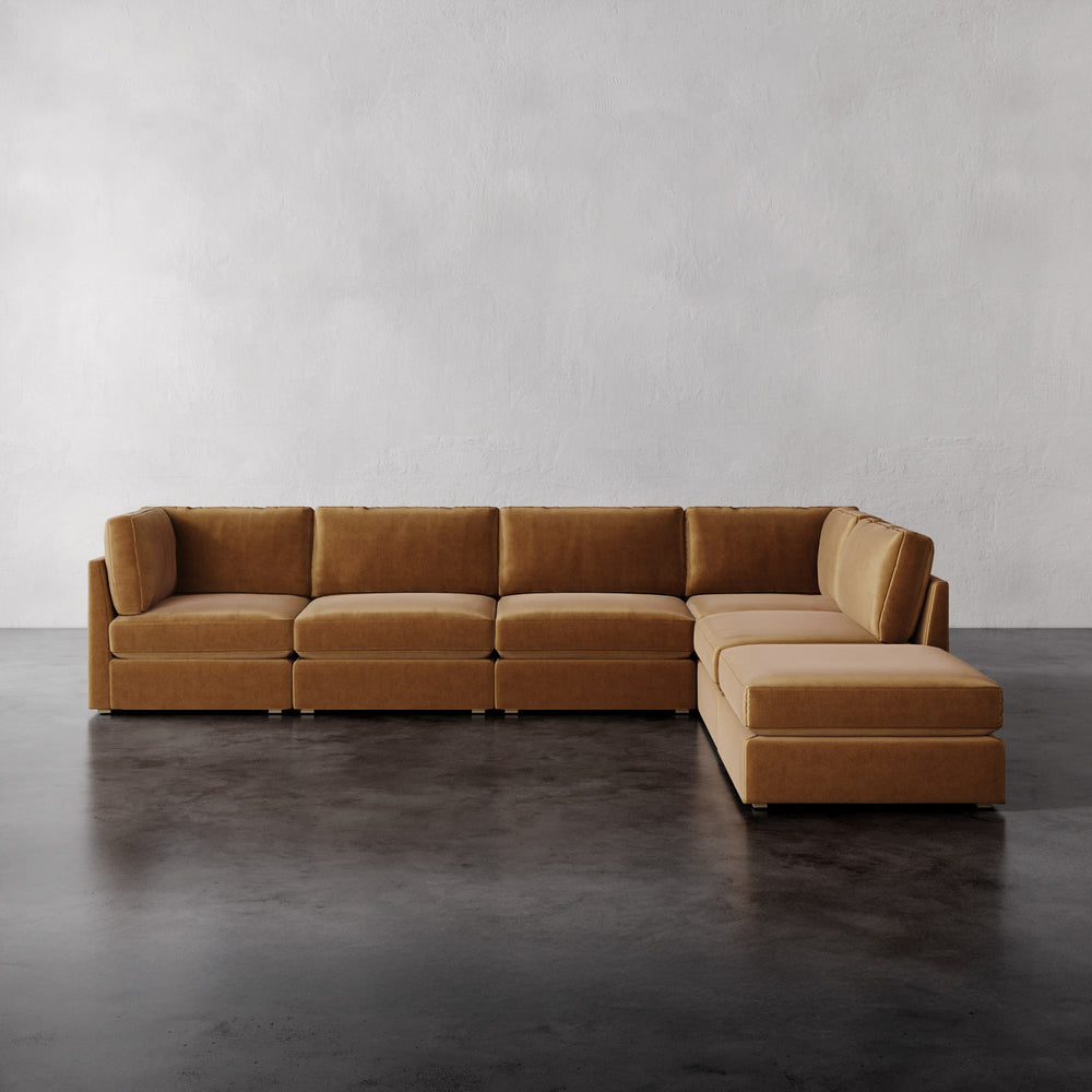Lemieux Et Cie Chanaux 6-Pc Sectional
Brown sectional sofa on a dark floor with a light gray wall background