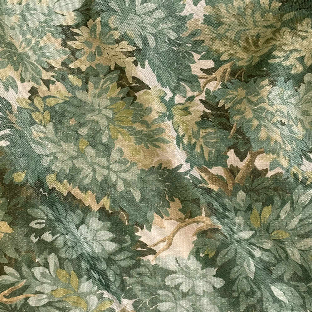 Lemieux et Cie Outdoor Pillow in Foliage Tapestry green and cream botanical print, double-sided water-resistant pillow, close detail of floral motif.