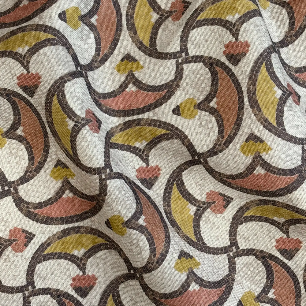 Lemieux et Cie Algerian Mosaic Outdoor Pillow in ivory, terracotta, charcoal and chartreuse, geometric arched pattern detail on woven textile surface.