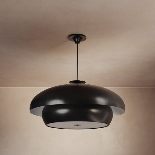 Lemieux et Cie Solene Chandelier in dark matte finish, sculptural pendant with layered dome form, hung from warm plaster ceiling in soft light.