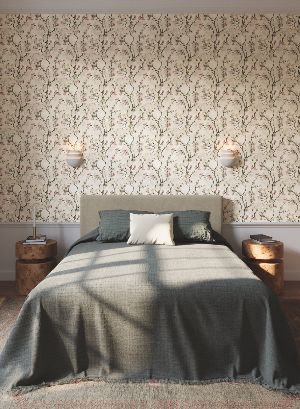 Lemieux et Cie La Broderi in sky blue and creamy white, geometric embroidered trim swatch, styled in bedroom with floral wallpaper and wood nightstands.