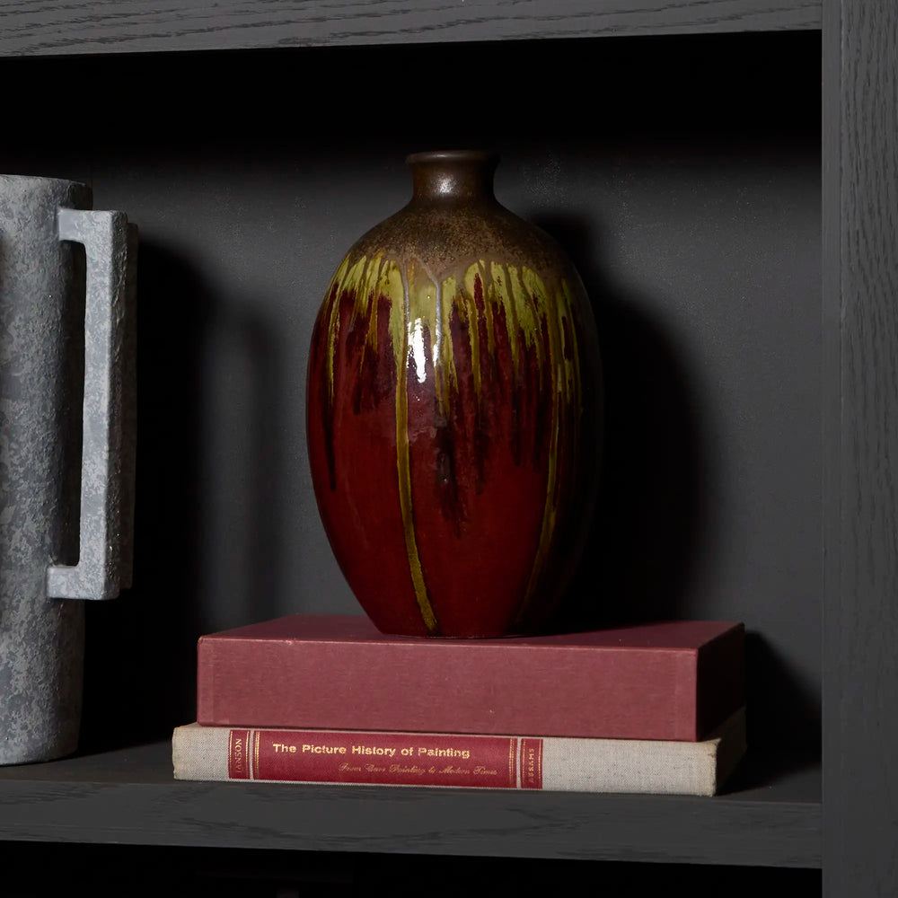 Vintage studio pottery vase with incredible reactive oxblood glaze