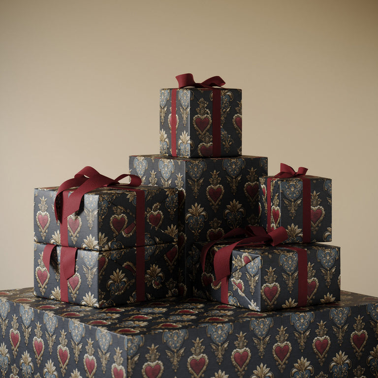 Stack of gifts wrapped in Lemieux et Cie Love Embroidery fancy gift wrapping paper Inspired by historic French embroidery once produced for royal courts  and couture houses