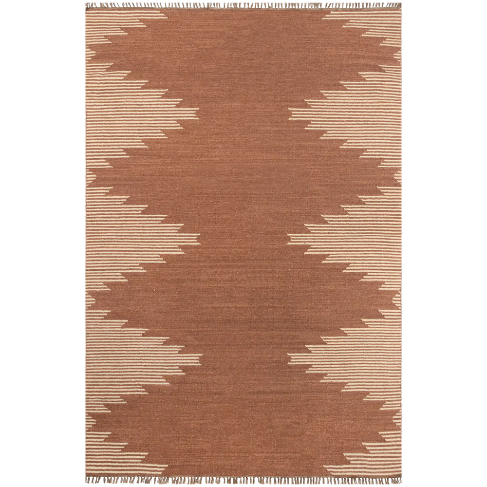 Lemieux et Cie Metlili rug in terracotta with ivory geometric border, handwoven wool with antique wash, shown with knotted fringe on neutral backdrop.