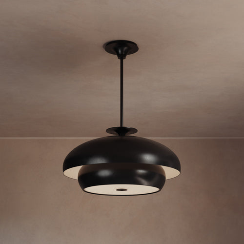 Lemieux et Cie Solene Chandelier in dark matte finish, sculptural tiered pendant with rounded dome forms, hung from neutral ceiling in soft warm light.