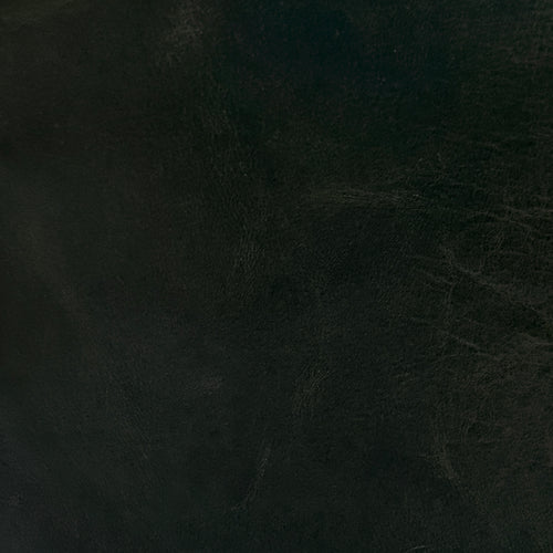 Lemieux et Cie Aniline Leather Swatch in deep forest green, material sample showing rich texture and natural grain.