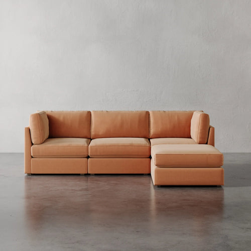 Lemieux Et Cie Chanaux 4-Pc Sectional
 Orange sectional sofa against a plain wall.