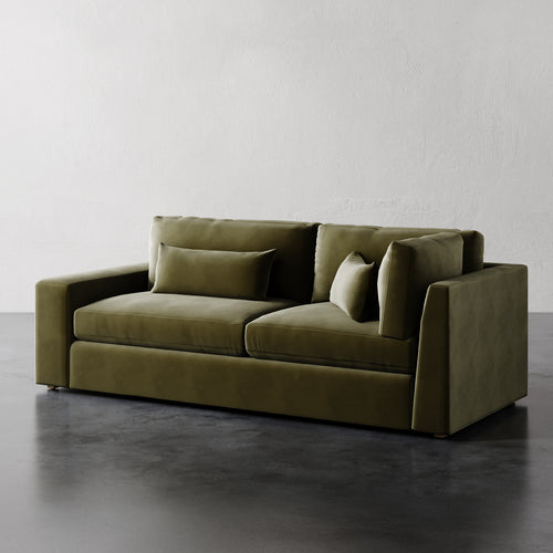 Lemieux Et Cie Lacroix Left or Right Return Sofa  A dark green, modular Lacroix Left or Right Return Sofa with a modern design, featuring deep seats and clean rectilinear lines.
