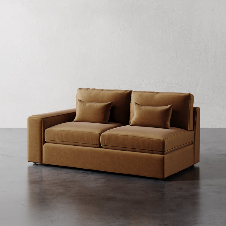 Lemieux Et Cie Lacroix Left or Right Arm Loveseat A dark green Lacroix left or right arm loveseat with two seat cushions and two bolster pillows, set against a neutral background.