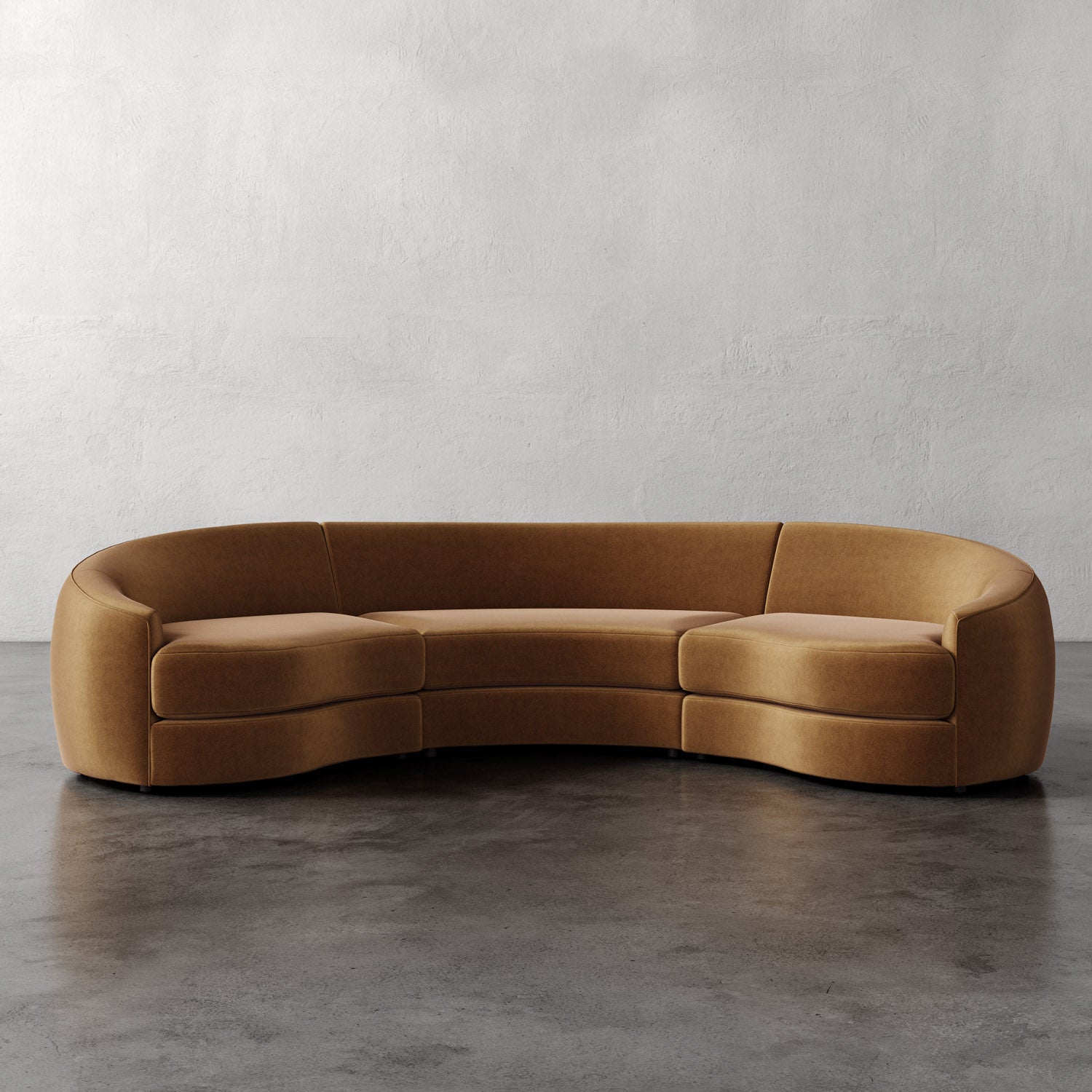 Lemieux Et Cie Rulmann Rulmann 3-Piece Sectional Brown curved sofa on a gray floor with a white wall background