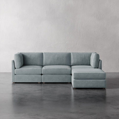 Lemieux Et Cie Chanaux 4-Pc Sectional
 Gray sectional sofa on a concrete floor with a light gray wall background