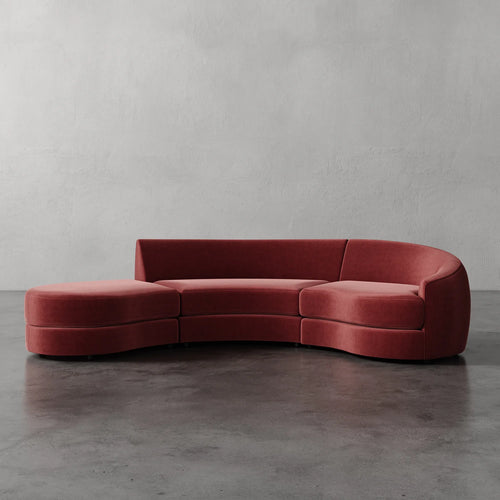 Lemieux Et Cie Rulmann 3-Piece Right Sectional  Curved red sofa against a gray wall
