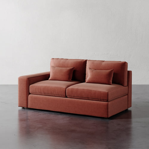 Lemieux Et Cie Lacroix Left or Right Arm Loveseat A dark green Lacroix left or right arm loveseat with two seat cushions and two bolster pillows, set against a neutral background.
