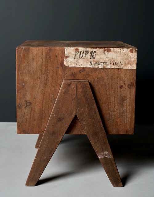 Lemieux et Cie Pierre Jeanneret bedside table in solid teak - side view with the P.U.P.10 / B. HOSTEL 118/C stencil and outward-splayed legs