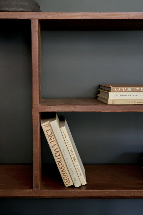 Lemieux et Cie Pierre Jeanneret bookcase in solid teak - close-up of the right-hand open shelves of differing heights with books