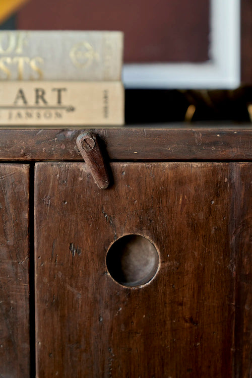 Lemieux et Cie Pierre Jeanneret teak cabinet - detail of the recessed circular pull and the original wooden toggle latch