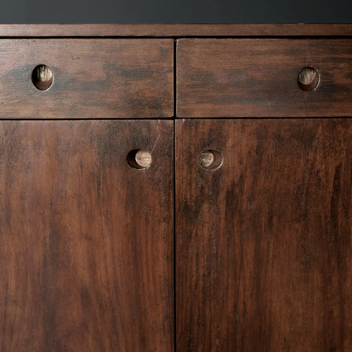 Lemieux et Cie Pierre Jeanneret library storage cabinet in solid teak - close-up of the two top drawers and the two hinged doors with circular cutout pulls